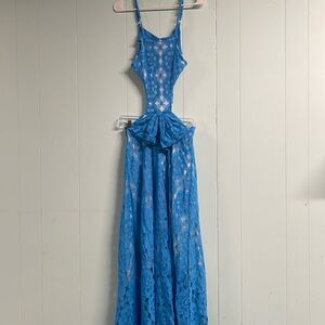 Long dress with bow detail and side cut outs